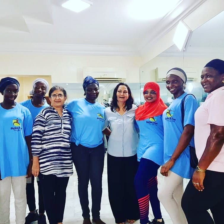Rhythm N Flow wellness team group at a community health event